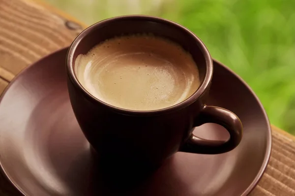 Cup Aromatic Coffee Foam Background Green Grass Close — Foto de Stock