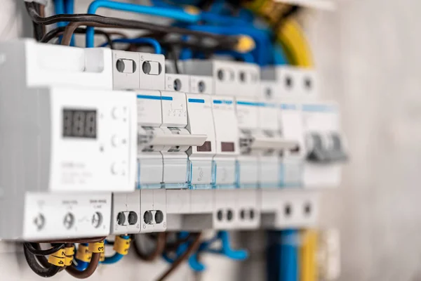 Switchboard with many switches and fiber optic cables. — Stock Photo, Image