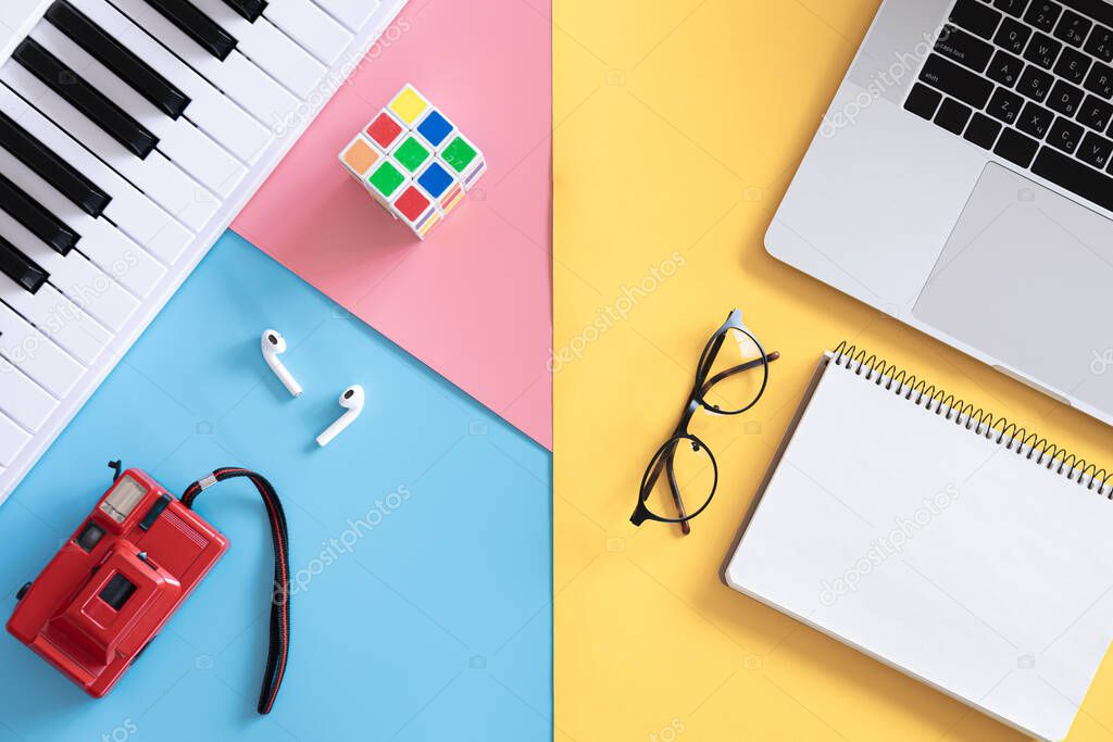 Blank notepad on colored background, creativity concept, flat lay, minimalism.