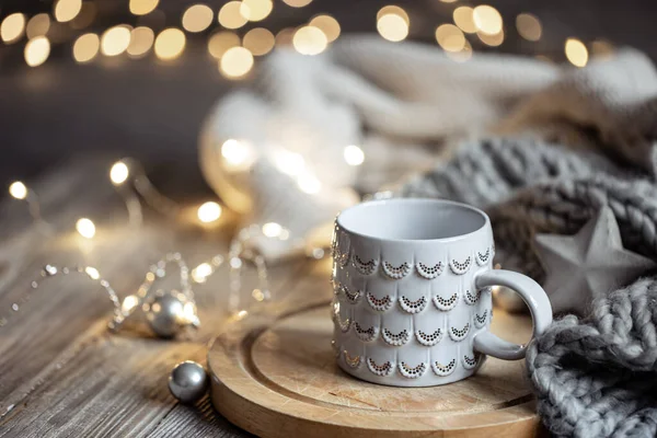 Beautiful Christmas cup on a blurred background with bokeh. — Stockfoto