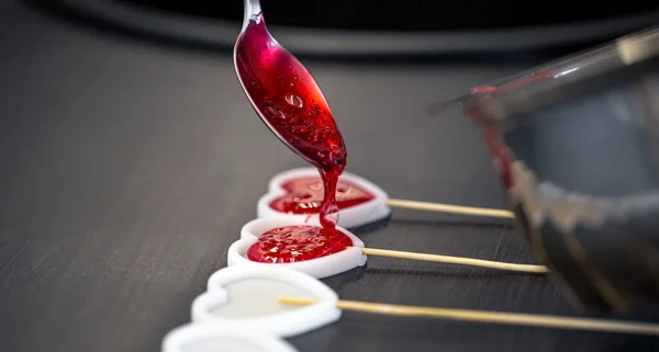 Close-up, the process of making lollipops from natural ingredients. Royalty Free Stock Photos