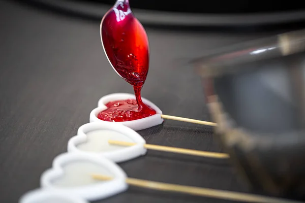 Close-up, the process of making lollipops from natural ingredients. Stock Picture