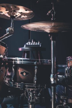Close-up, part of a drum kit on a blurred background.