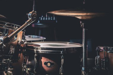 Close-up, part of a drum kit on a blurred background.