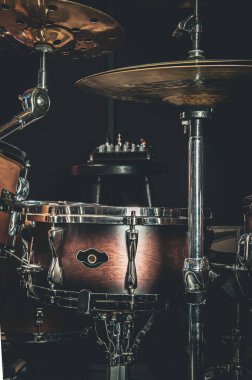 Close-up, part of a drum kit on a blurred background.