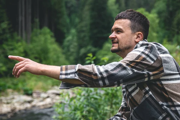 Young Man Plaid Shirt Forest River Enjoys Nature Wildlife — Stockfoto