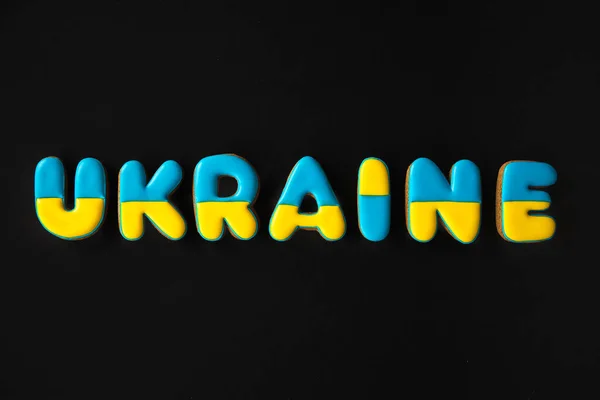 Word Ukraine Black Background Made Handmade Gingerbread War Concept Flat — стоковое фото