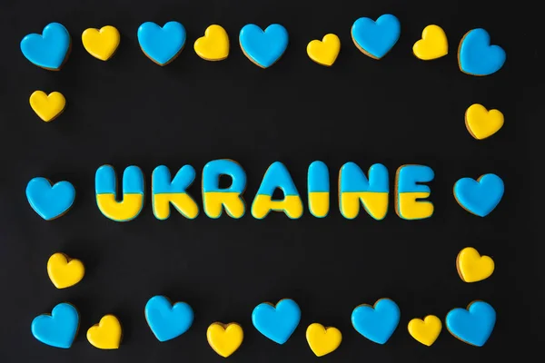 Word Ukraine Black Background Made Handmade Gingerbread War Concept Flat — ストック写真