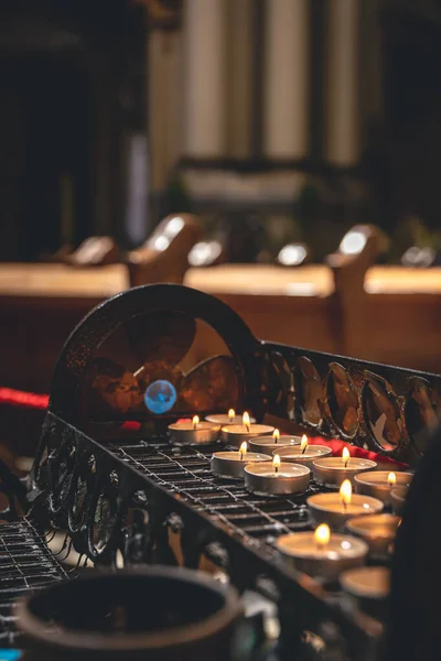 Many Small Candles Catholic Church Dark Interior — стоковое фото