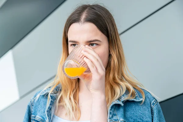 Young Woman Blue Denim Jacket Drinking Orange Juice — Foto de Stock