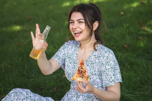 Portrait Young Woman Pizza Bottle Drink Picnic Grass — 스톡 사진