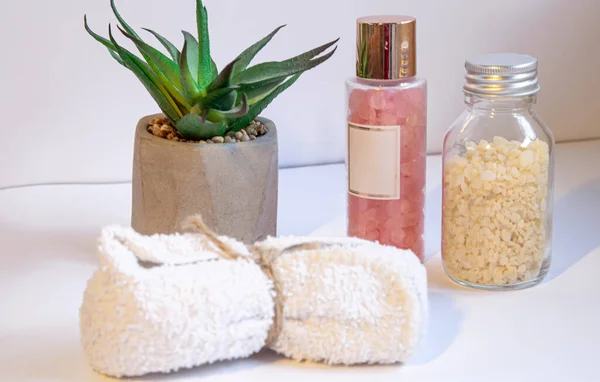 Home spa composition with body care and bath products.