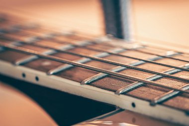 Strings on a classical acoustic guitar, macro shot.