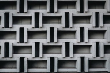 Betonun soyut geometrik arkaplanı, modernist bir binanın parçası, kapat.