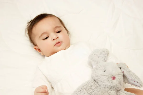 Little Cute Baby Girl Blanket Bunny Toy Soft Focus Background — Stock Photo, Image