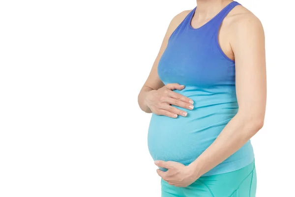 Sportowy Kobieta Ciąży Ręce Brzuchu Białym Tle — Zdjęcie stockowe