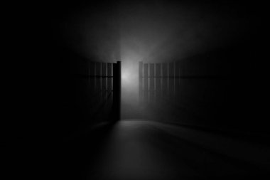 wood fence and light in darkness