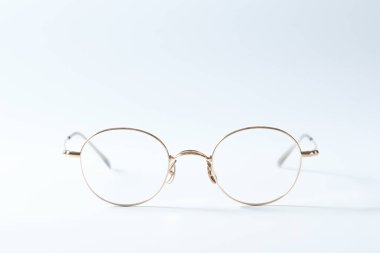 eyeglass on white background paper