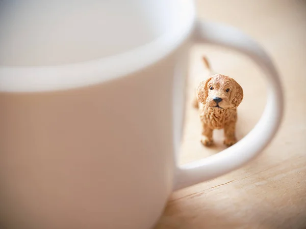 coffee cup and dog sigure