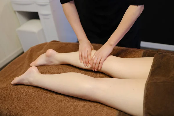woman massage foot in Japan