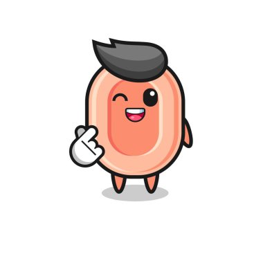 sabun karakteri Korece parmak kalbi yapıyor, şirin tasarım.