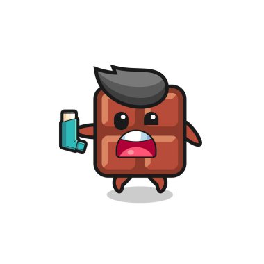 Çikolata maskotunun astımı vardı. Astım spreyini tutarken, şirin bir tasarım.