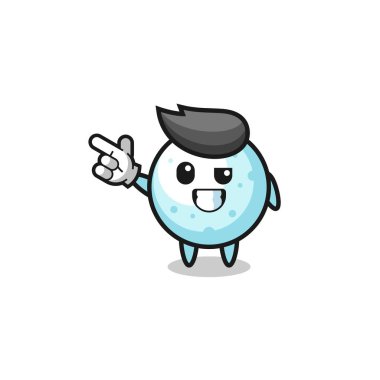 Kar topu maskotu sol üst tarafı işaret ediyor, şirin tasarım.