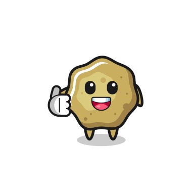 loose stools mascot doing thumbs up gesture , cute design