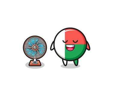 cute madagascar flag is standing in front of the fan , cute design