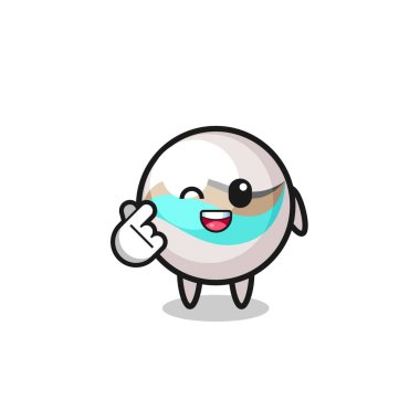 Mermer oyuncak karakter Korece parmak kalbi yapıyor, şirin tasarım.