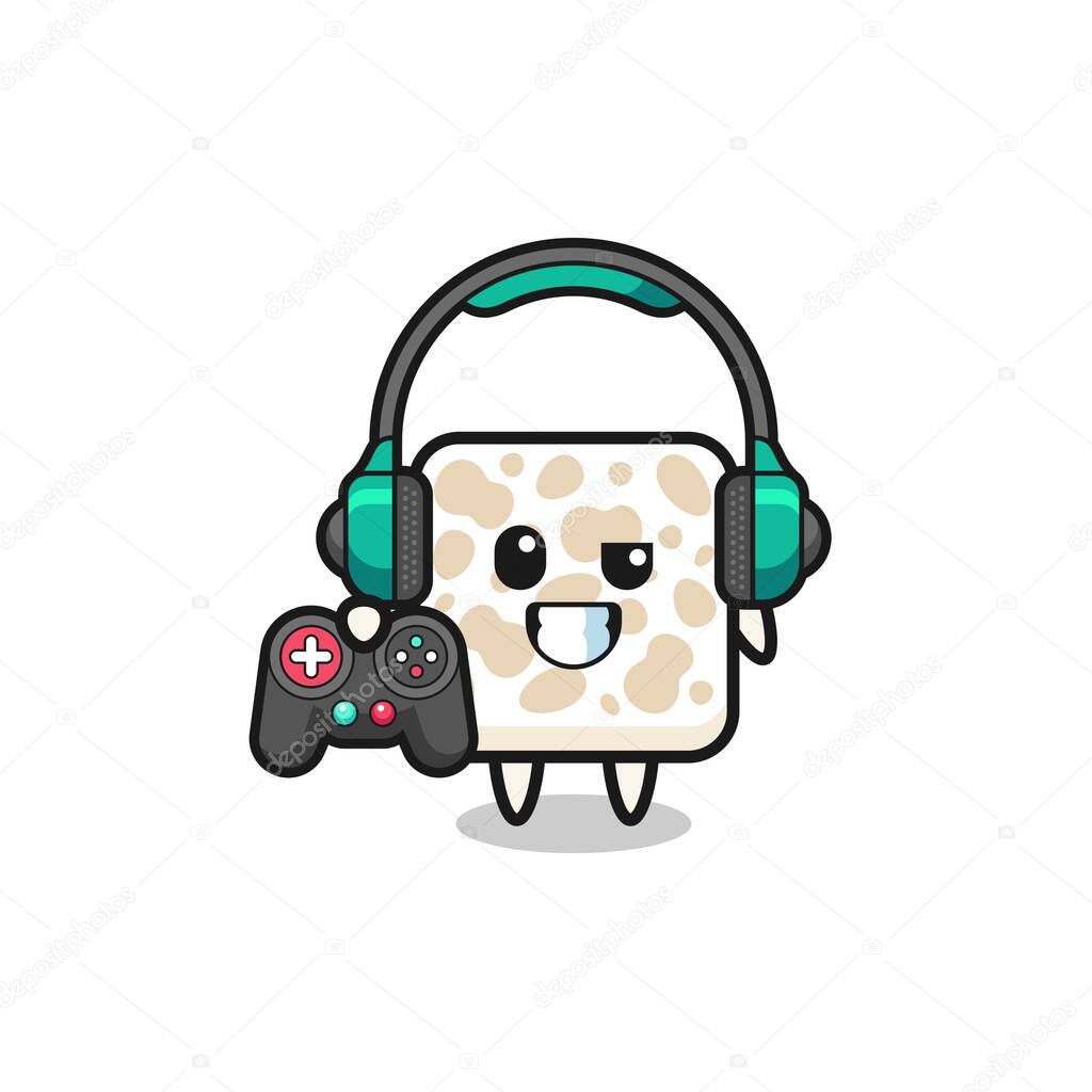 tempeh gamer mascot holding a game controller , cute design