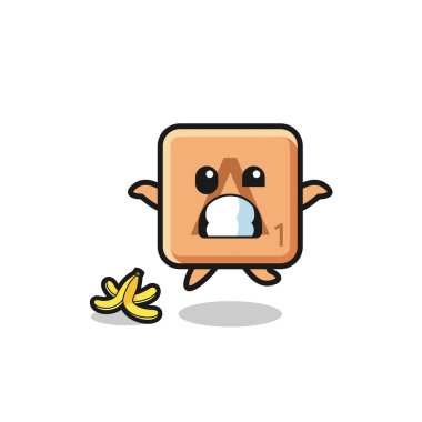 Scrabble çizgi filmi muz kabuğuna basıyor, şirin bir tasarım.