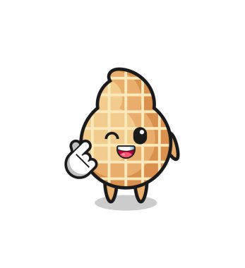 Fıstık ezmeli karakter Koreli parmak kalbi yapıyor, şirin tasarım.