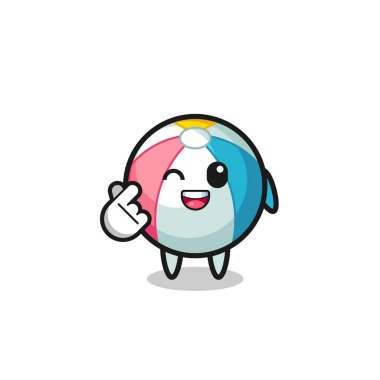 Sahil topu karakteri Koreli parmak kalbi yapıyor, şirin bir tasarım.