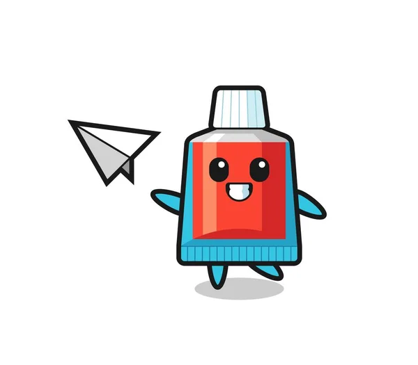 歯磨き粉漫画のキャラクター紙飛行機を投げる かわいいデザイン — ストックベクタ