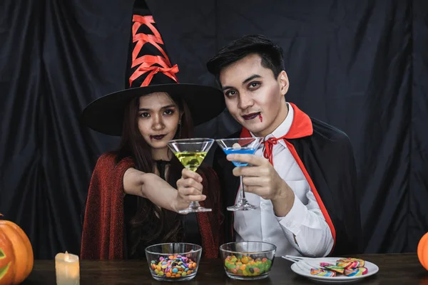 Young Asian Couple Costume Witch Dracula Celebrate Halloween Party Clink — стокове фото