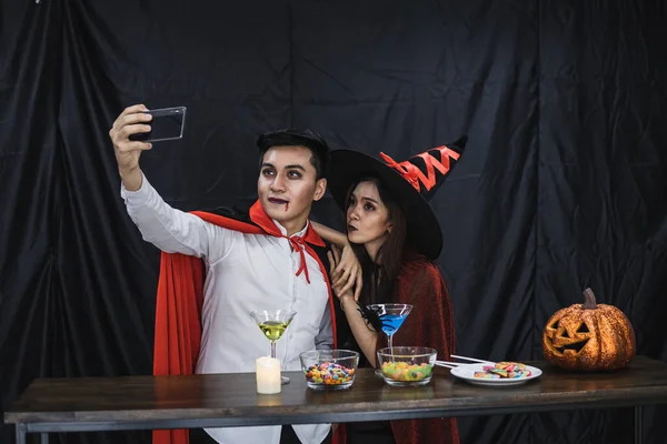 Young Asian Couple Costume Witch Dracula Selfie Mobile Celebrate Party — стокове фото