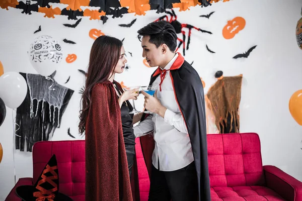 Young Asian Couple Costume Witch Dracula Celebrate Halloween Party Drink —  Fotos de Stock