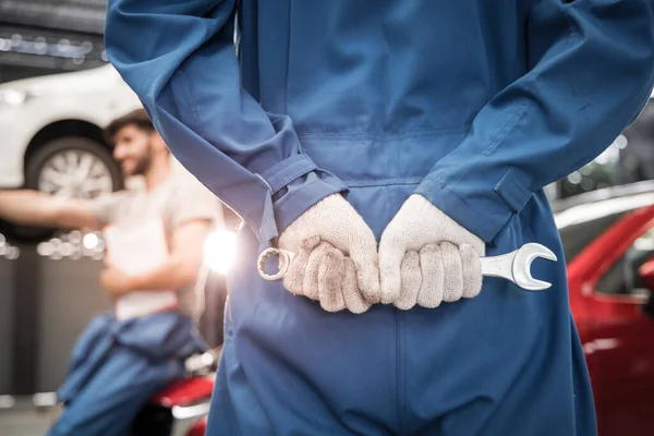 Mechanic Held Large Screwdriver Him Looking Colleagues — Fotografia de Stock