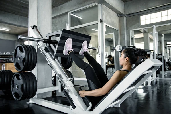Asian Sexy Woman Playing Weights Legs Exercise Machine Part Leg — Fotografia de Stock