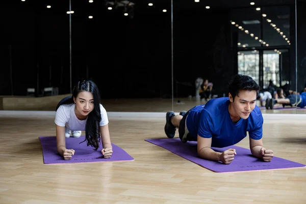 Young Couple Exercise Doing Yoga Yoga Mat Exercise Room Gym — Foto de Stock