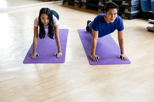 Young Couple Exercise Doing Yoga Yoga Mat Exercise Room Gym — Foto de Stock