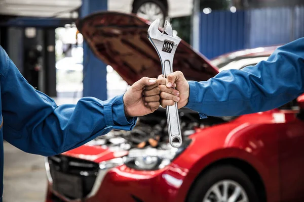 Fist Mechanics Hand Tool Two Auto Mechanic Doing Car Service — Fotografia de Stock