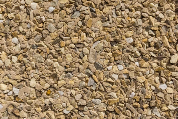 Detail der Textur Steintapete kleine Stücke verschiedene Steine — Stockfoto