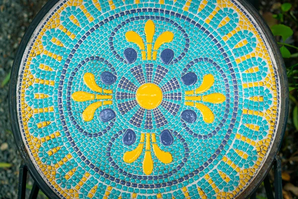 beautiful mosaic tile decoration on circle table