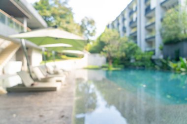 Yüzme havuzunun etrafında arka plan ve duvar kağıdı için soyut bulanık yatak havuzu