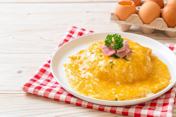 Pirinçli kremalı omlet veya jambonlu pilav ve yumuşak omlet.