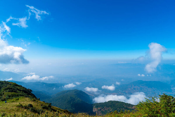 beautiful mountain layer with clouds and blue sky at  Kew Mae Pan Nature Trail in Chiang Mai, Thailand