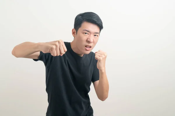 Ung Asiatisk Man Med Stansande Hand Vit Bakgrund — Stockfoto