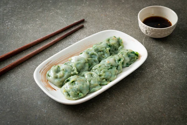 steamed chives dumplings with sauce - Asian food style